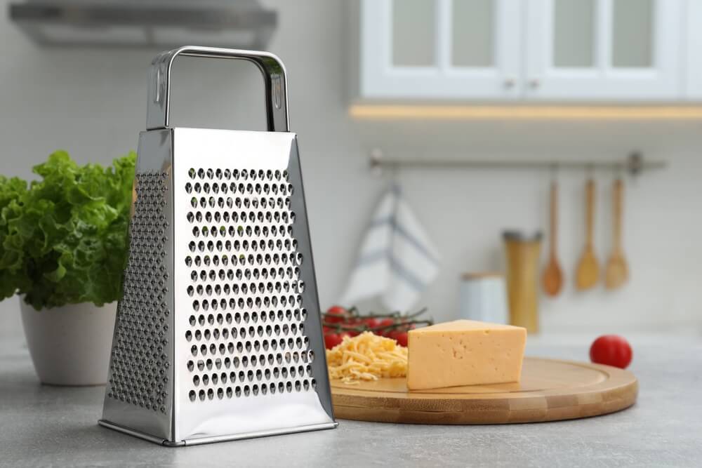 Cheese grater featuring a comfortable handle for efficient grating